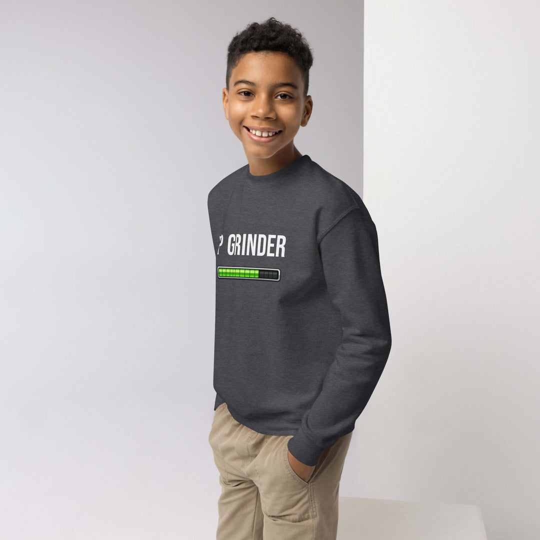 XP Grinder Youth crewneck sweatshirt worn by a smiling boy in a casual setting.